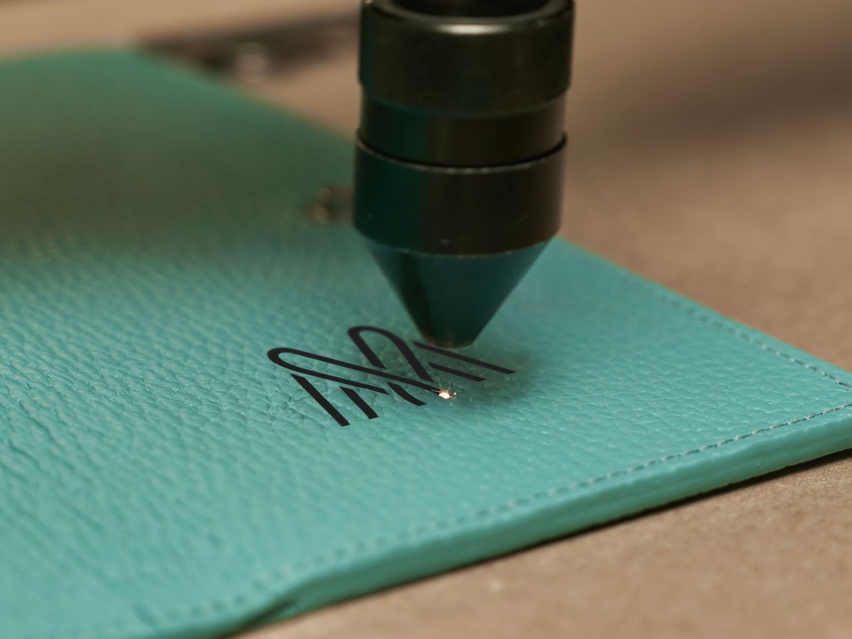 Laser engraving a logo on leather
